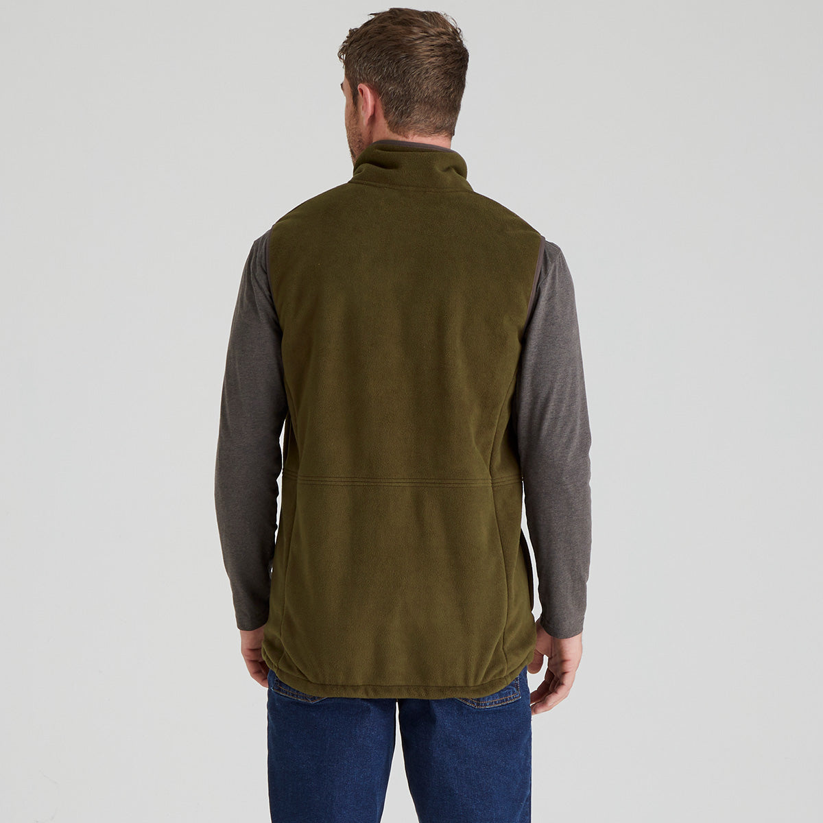 back view of man wearing brown fleece gilet
