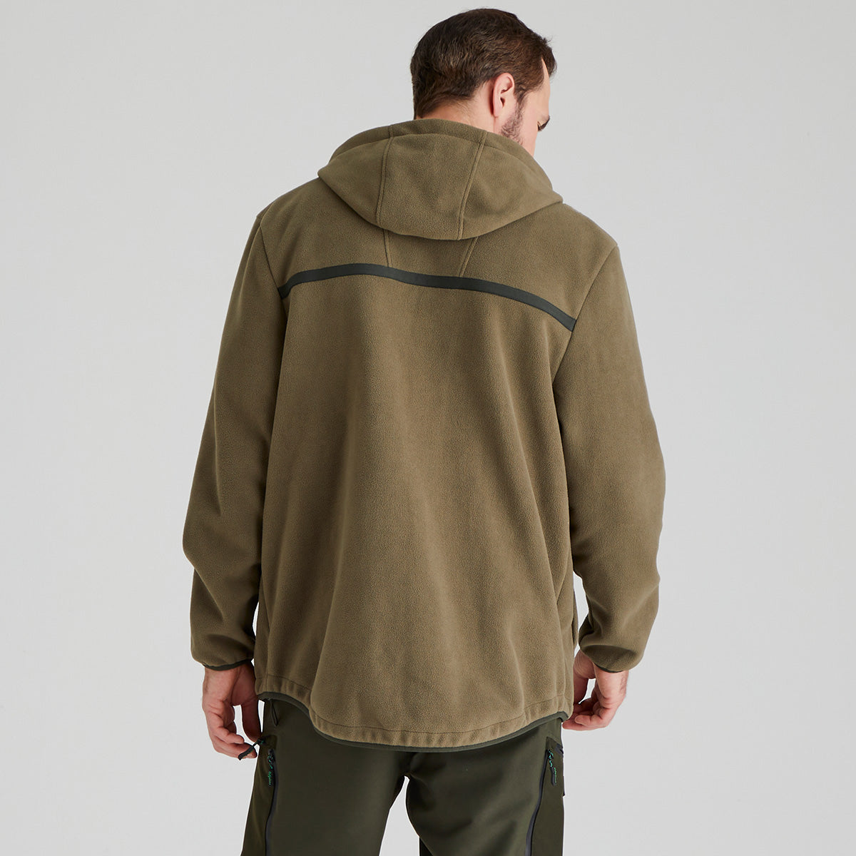back view of man wearing green fleece jacket