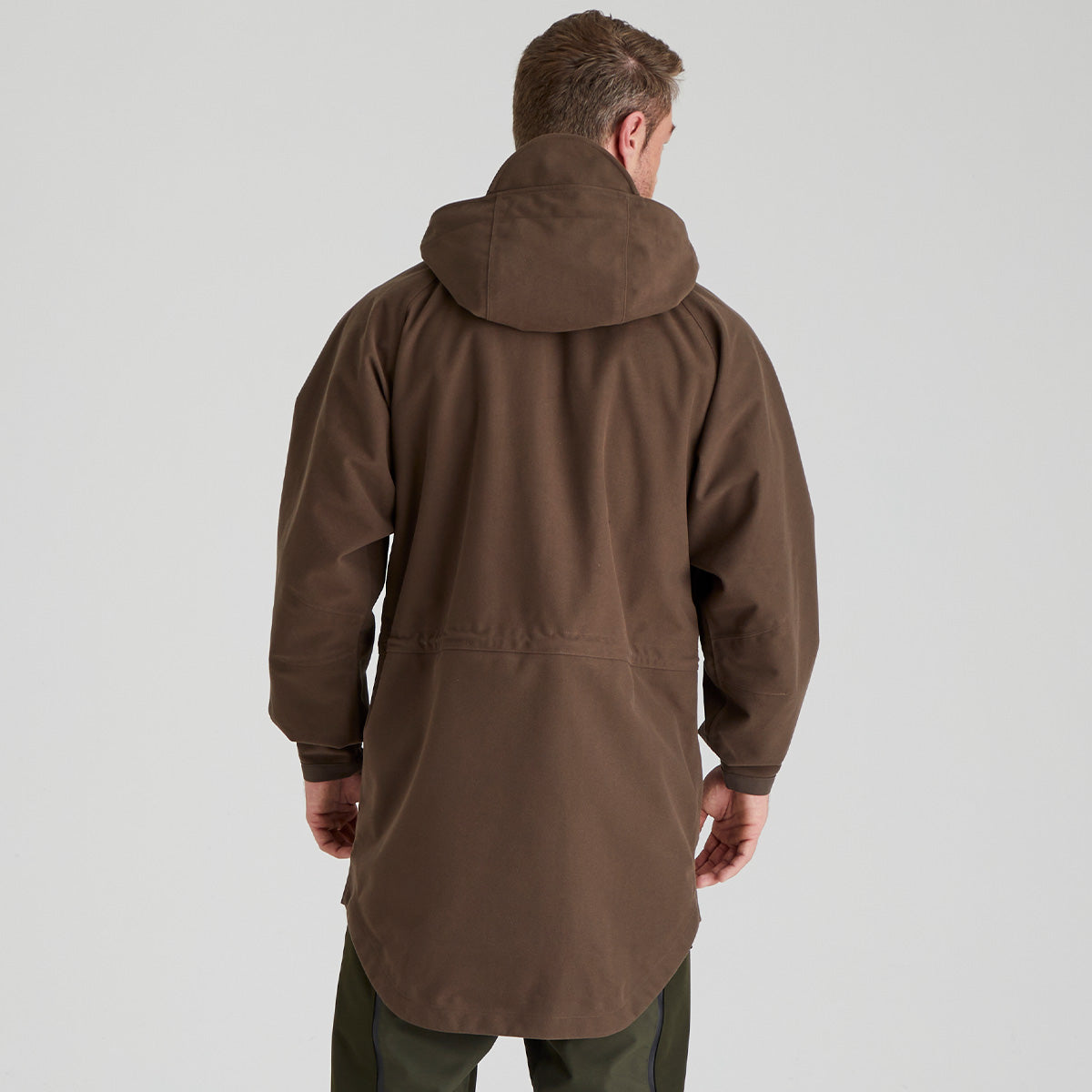 back view Man wearing a brown hooded coat on a light grey background