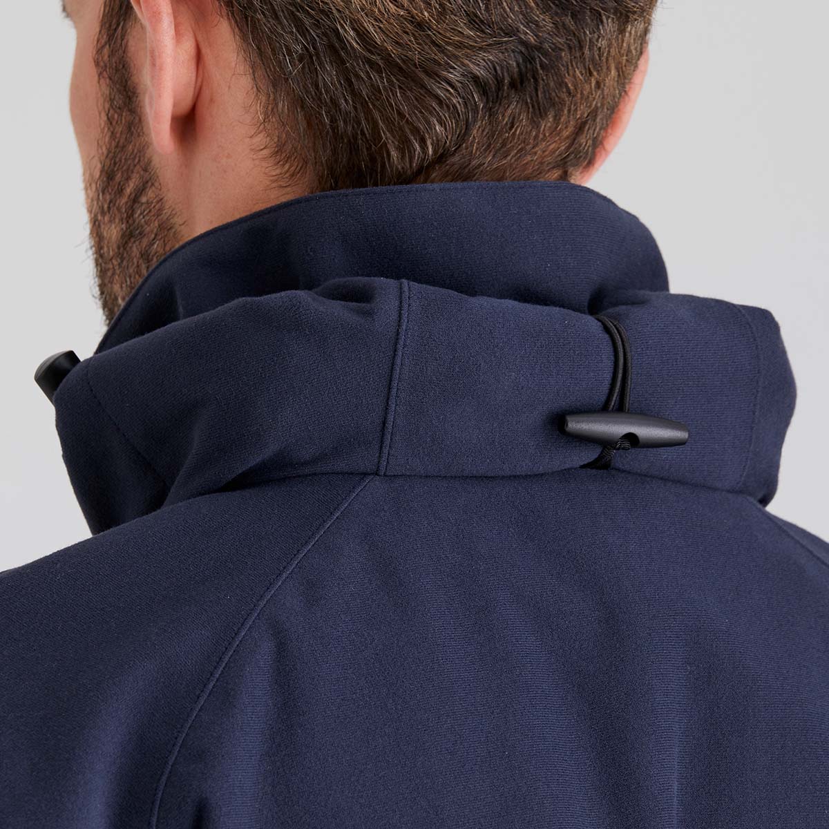 Showing Roll away hood with a button on a plain background
