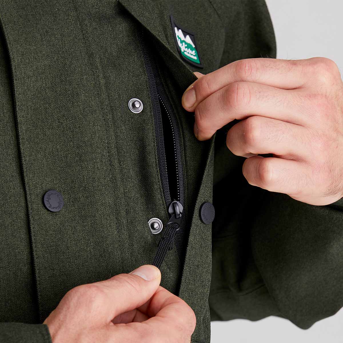 Showing close up of zipped chest pocket