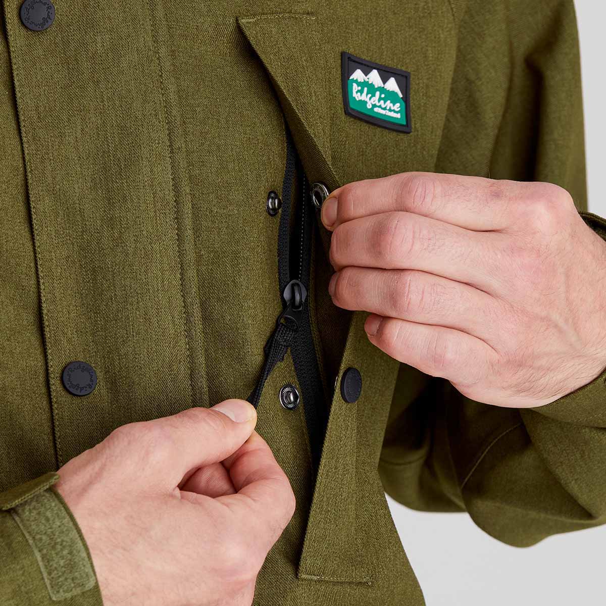 Close up of hidden chest pocket with zip