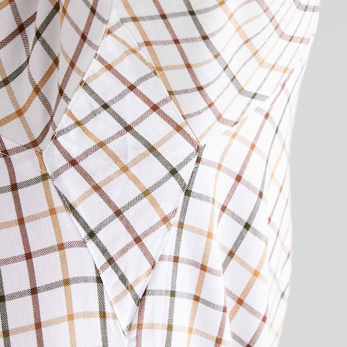 Plaid fabric with brown, beige, and gray pattern on a white background