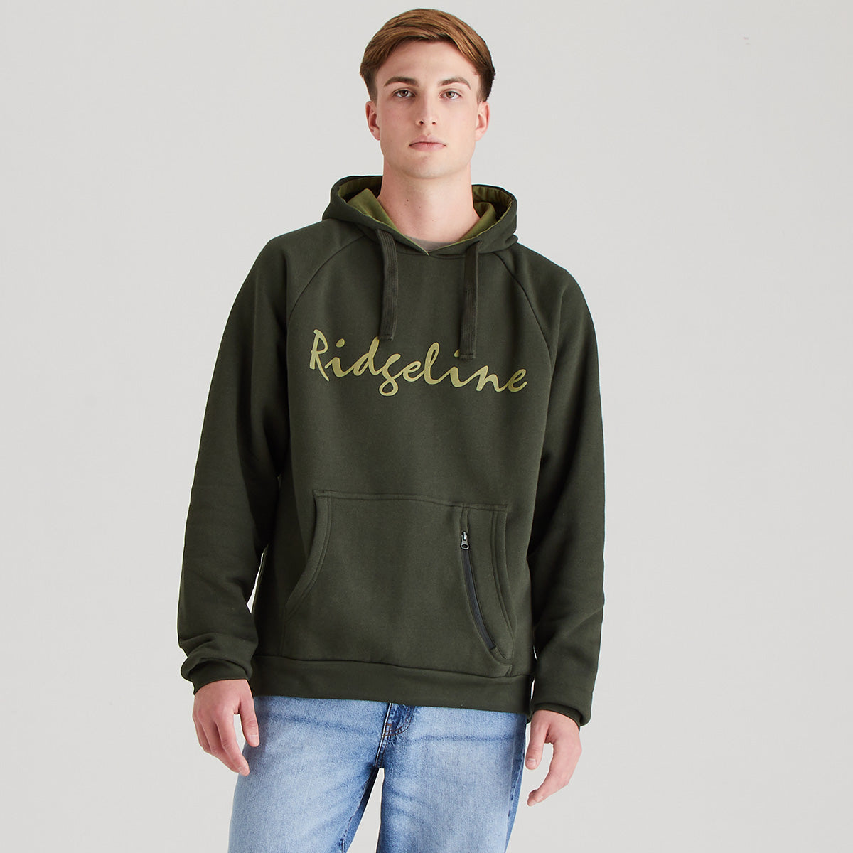 Person wearing a green hoodie with 'Ridgeline' branding on a light gray background
