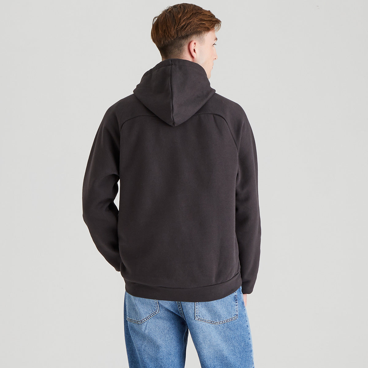 Grey/ black hoodie back on a grey background