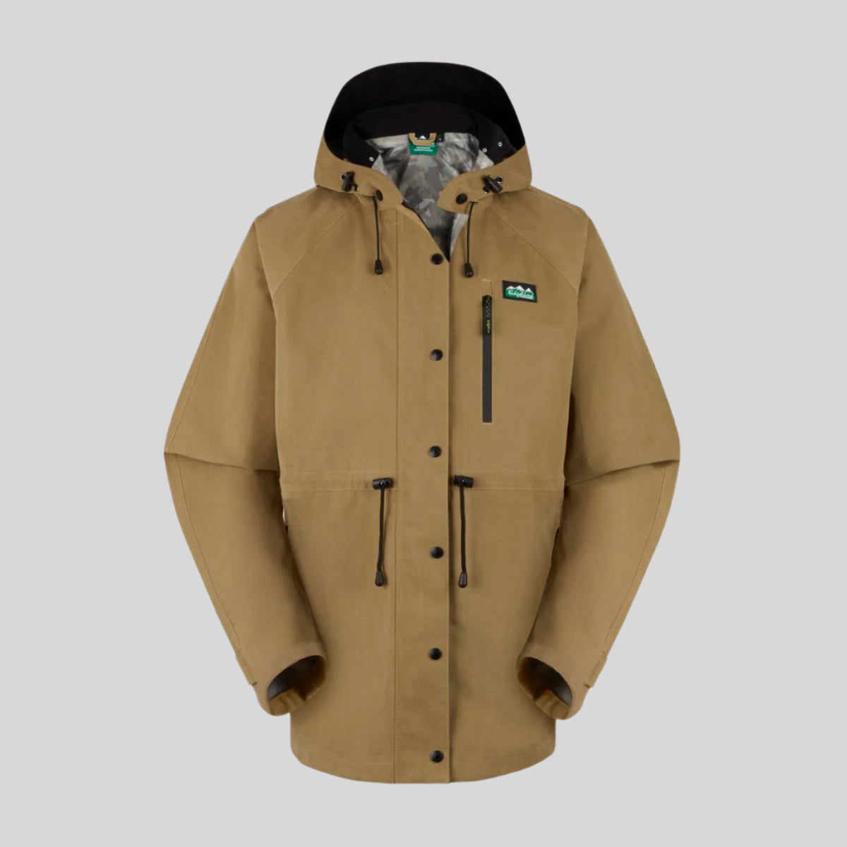 A beige Monsoon Nunatak Jacket with a full-length front zip, hood, and multiple pockets. with the Ridgeline logo