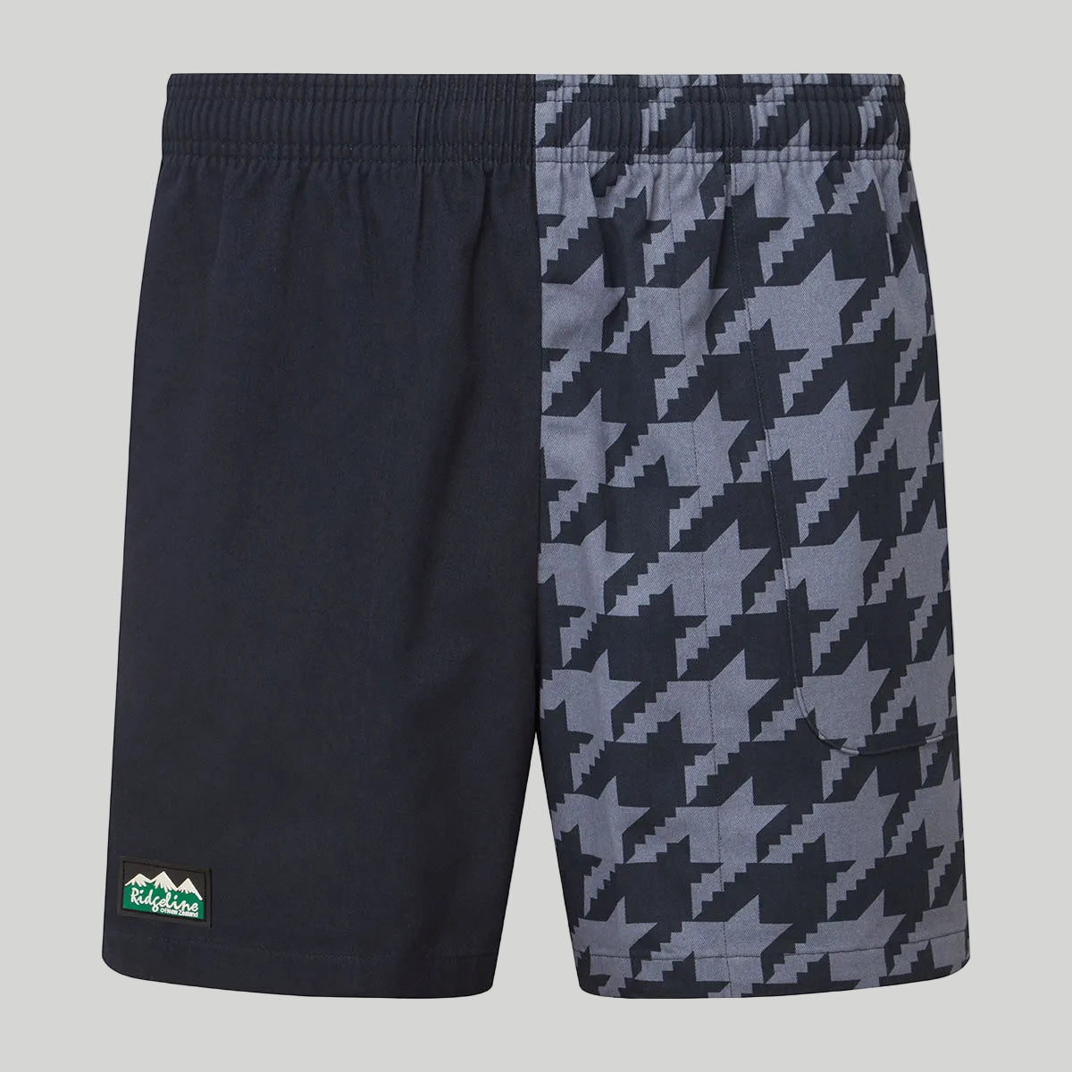 Black shorts with houndstooth pattern on a white background