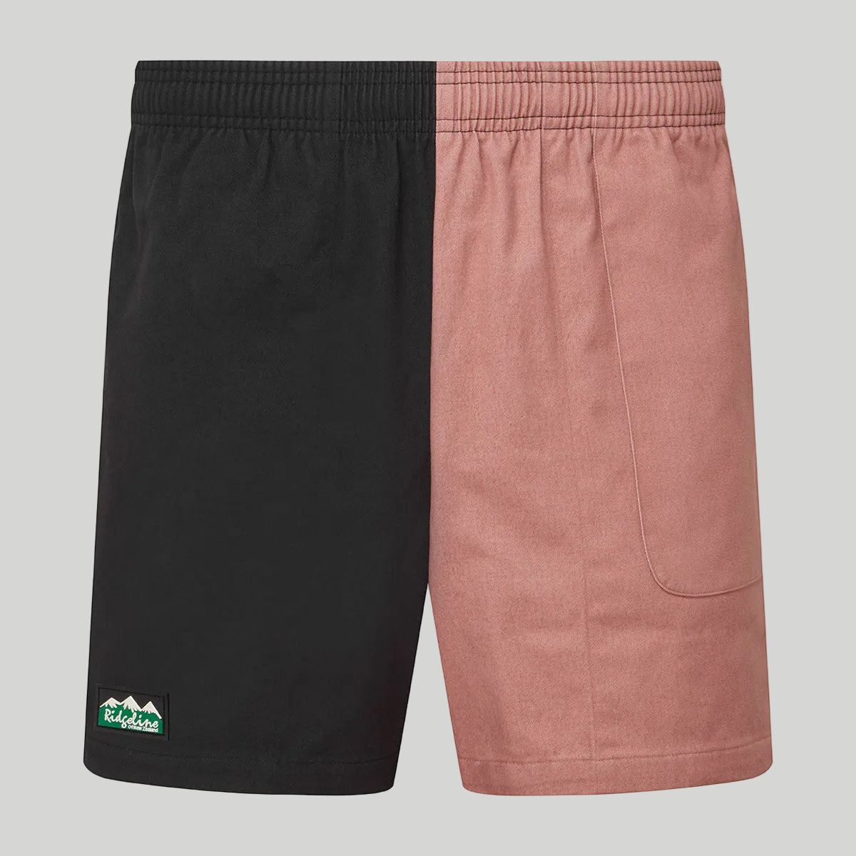 Black and pink shorts with a visible brand logo on a white background