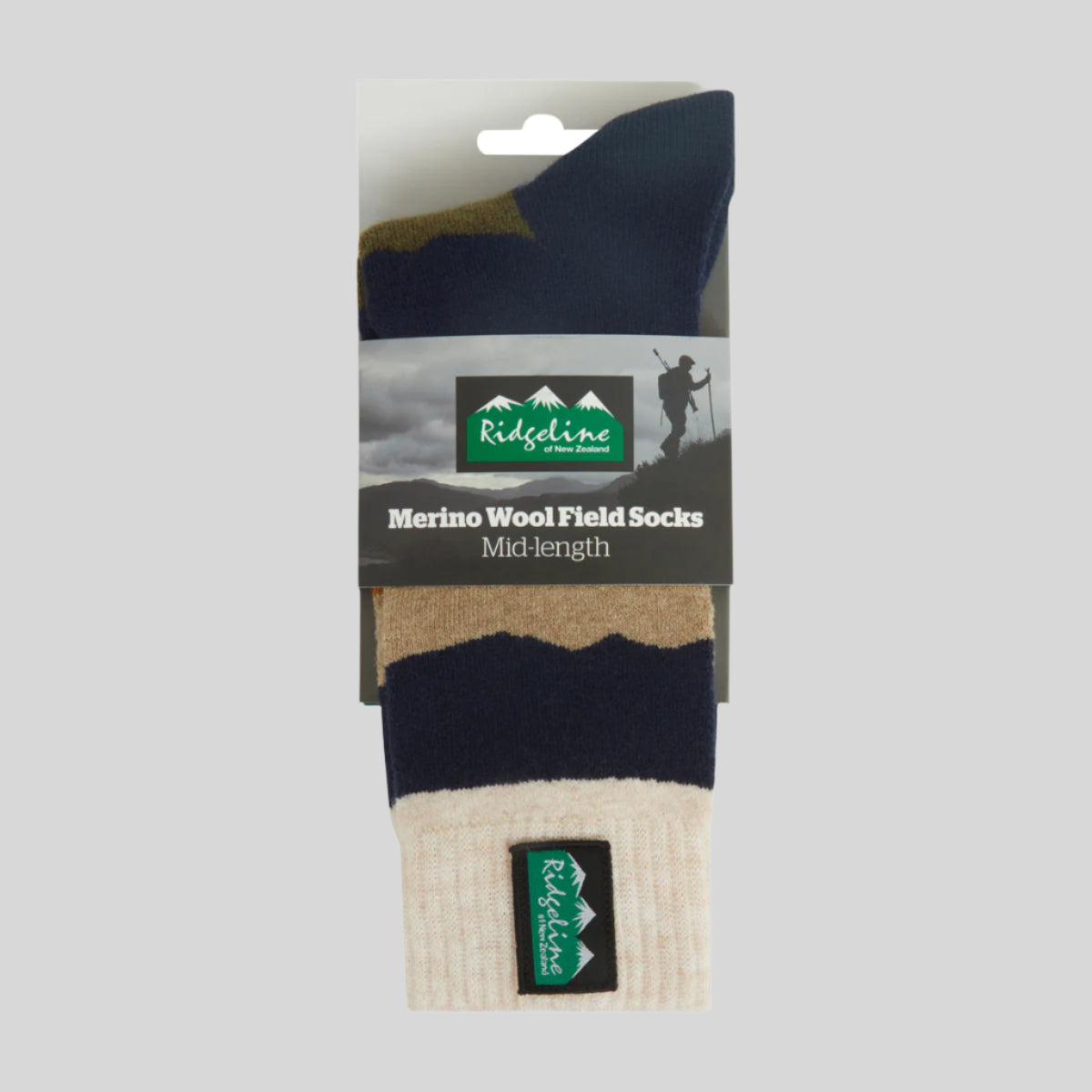 Packaged merino wool field socks with Ridgeline branding on a white background