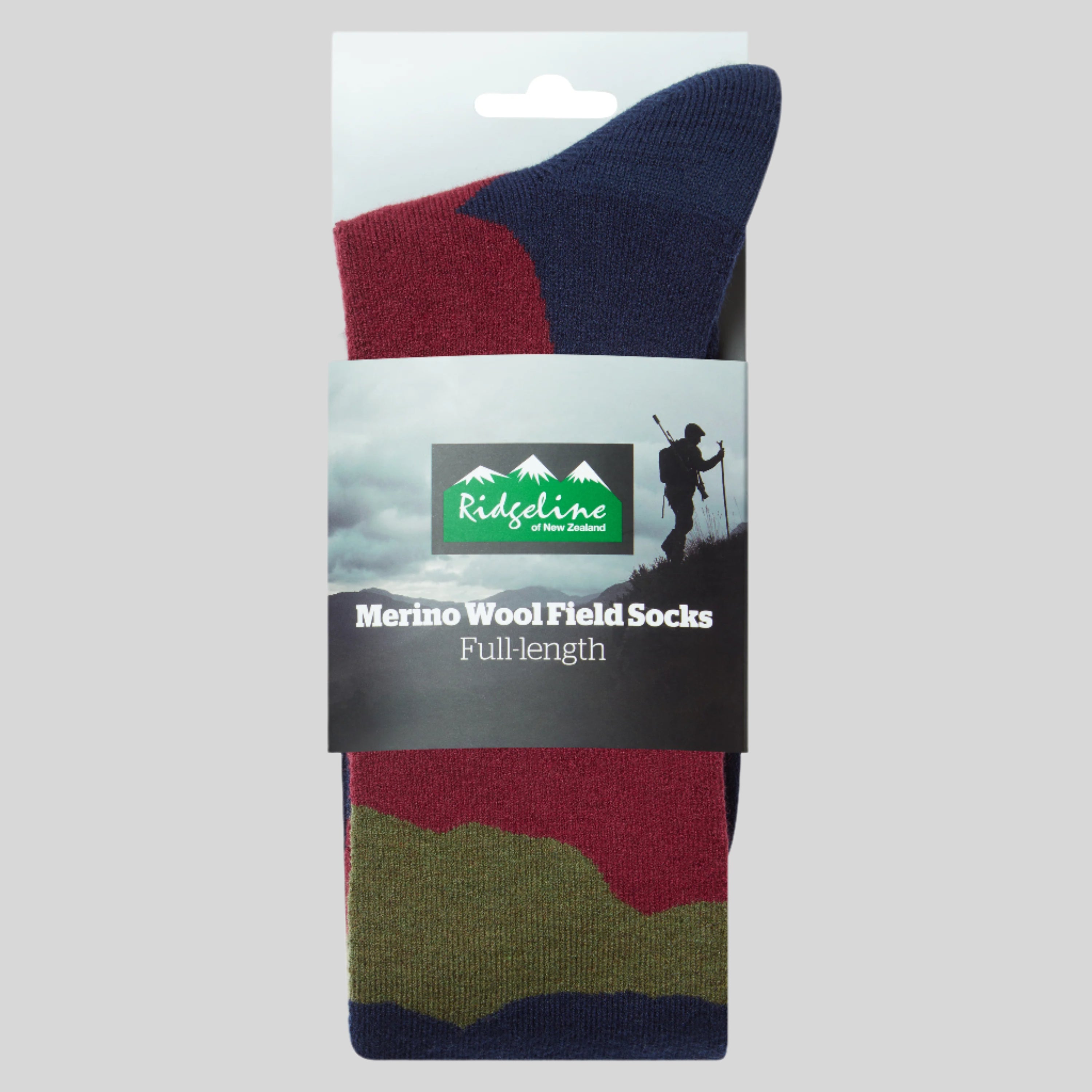 Packaged merino wool field socks with Ridgeline branding on a white background