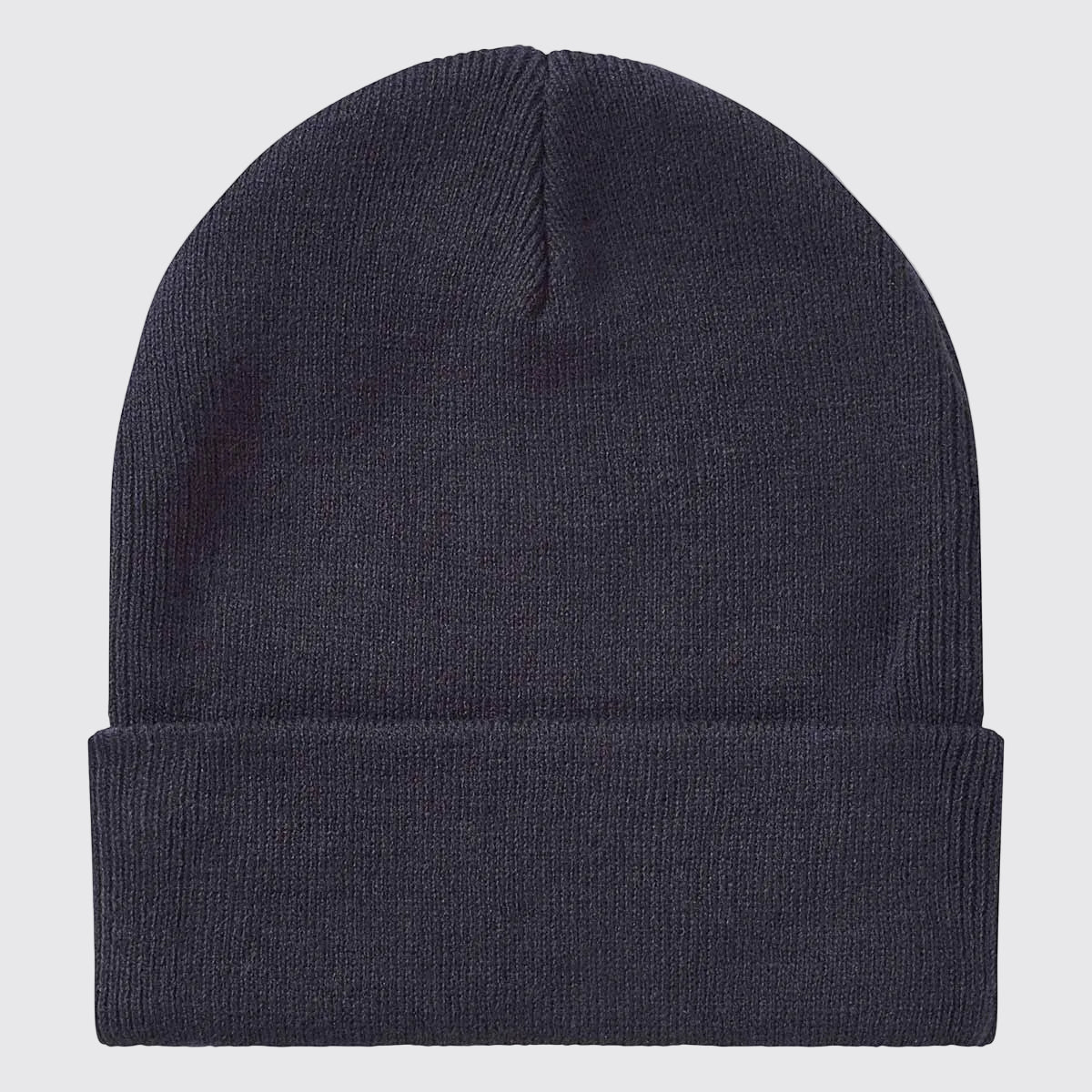 Rear view of a navy blue ribbed knit beanie with a folded cuff, displayed against a light grey background. The beanie features a clean, minimalist design with no visible branding on the back. The fine knit texture, central top seam, and stretch-fit construction are clearly visible, highlighting the hat's simple, versatile style and warm winter-weather design.