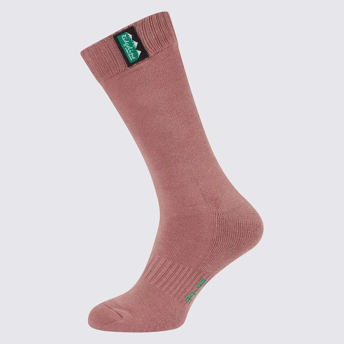 Pnik knee-high ribbed sock with green Ridgeline logo tag at cuff, side view on a gray background
