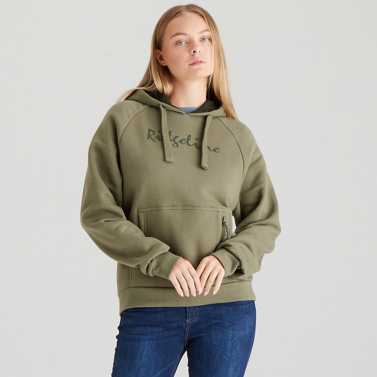 Person wearing a green hoodie with text on a plain background