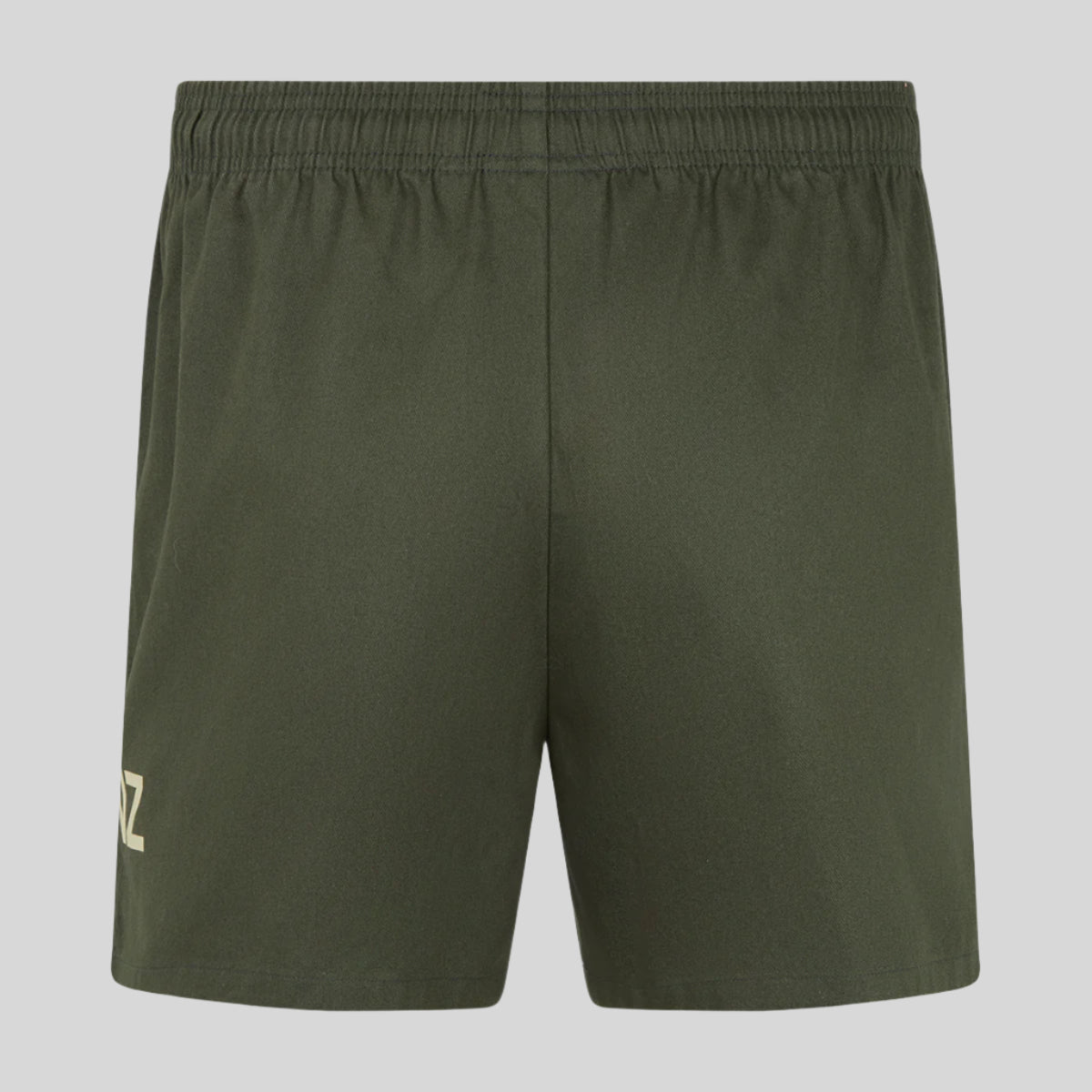 Green shorts with a brand logo on a white background
