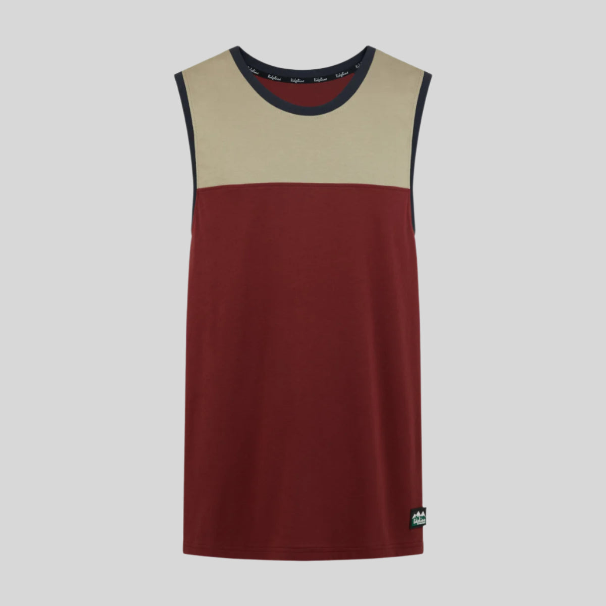 A sleeveless singlet top with a beige upper and red lower color blocks, featuring a round neckline and a small brand logo on the bottom right.