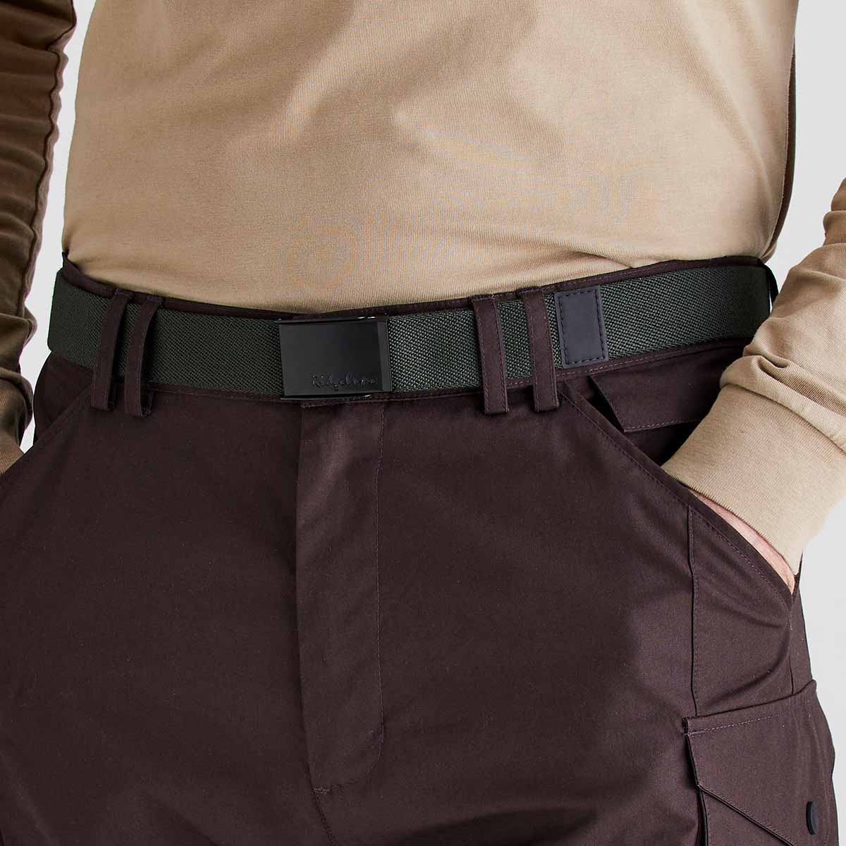 Ridgeline green woven fabric belt with Ridgeline‑inscribed black plaque buckle, worn with trousers, front view close-up