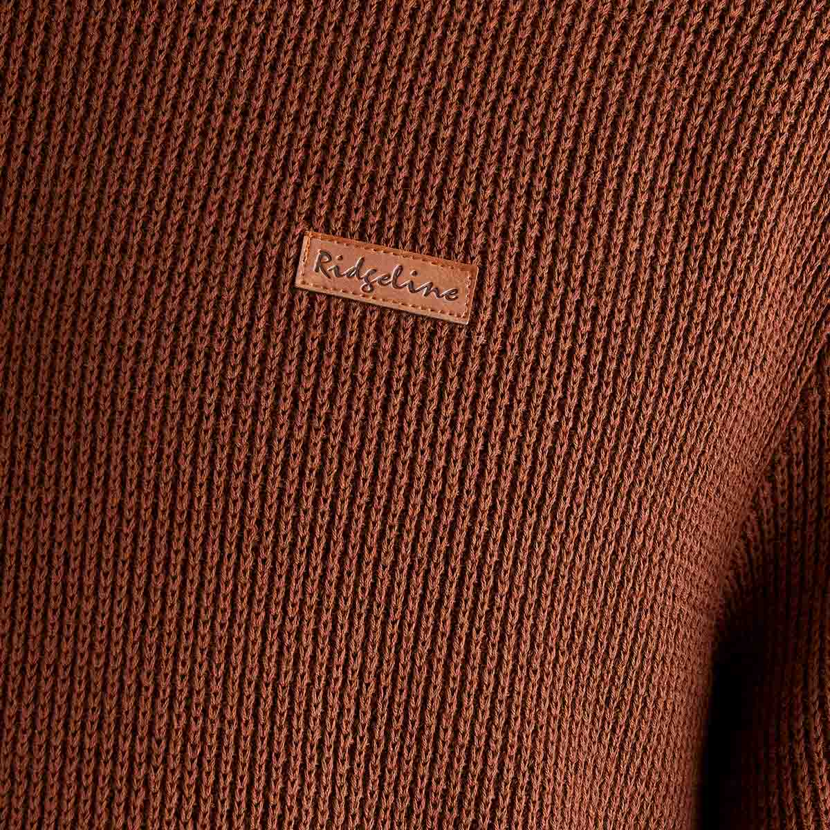 Close-up of a brown textured fabric with a 'Ridgeline' label.