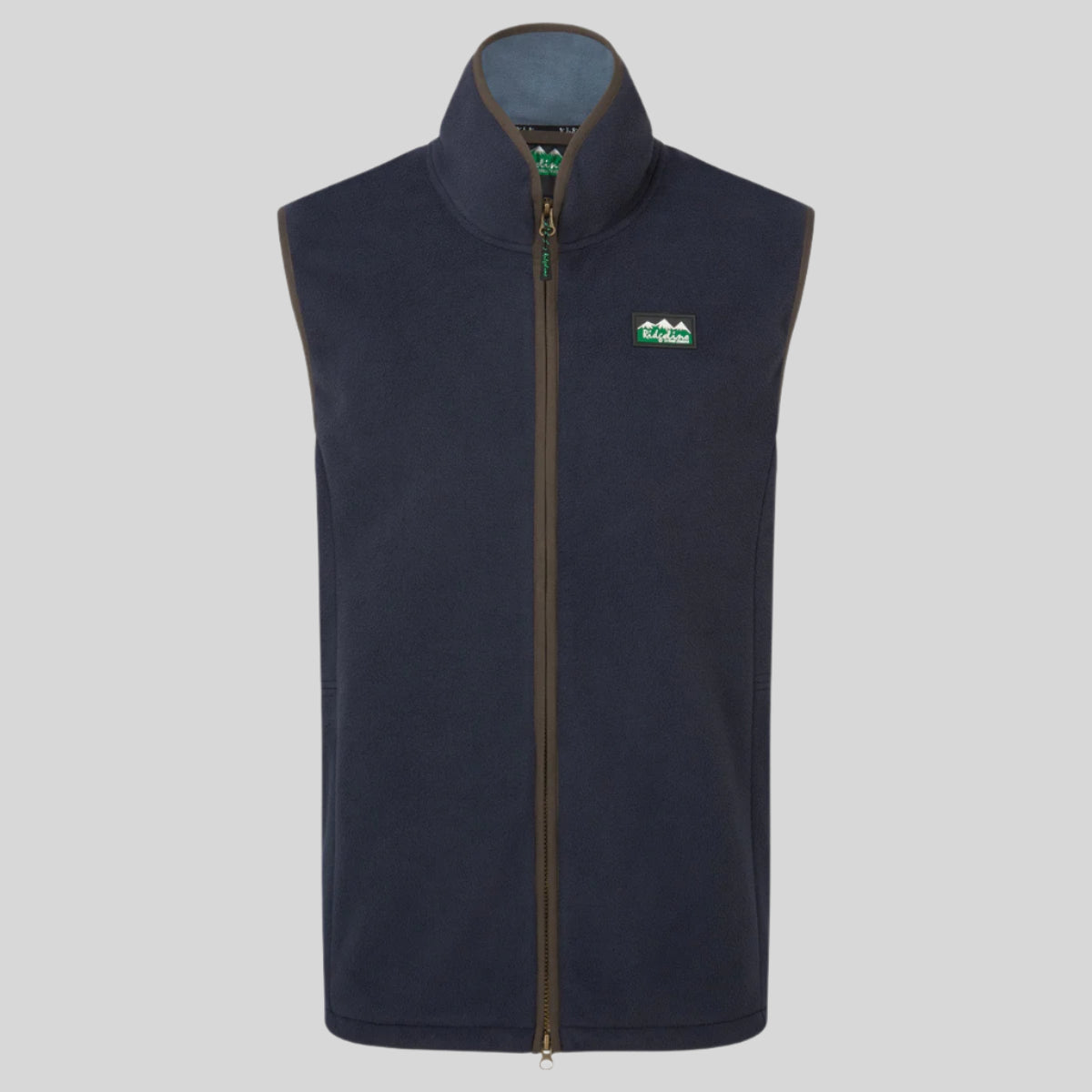 A navy fleece gilet with a high collar, two-way front zip, and hand pockets with zippers. It features a premium faux-suede trim.