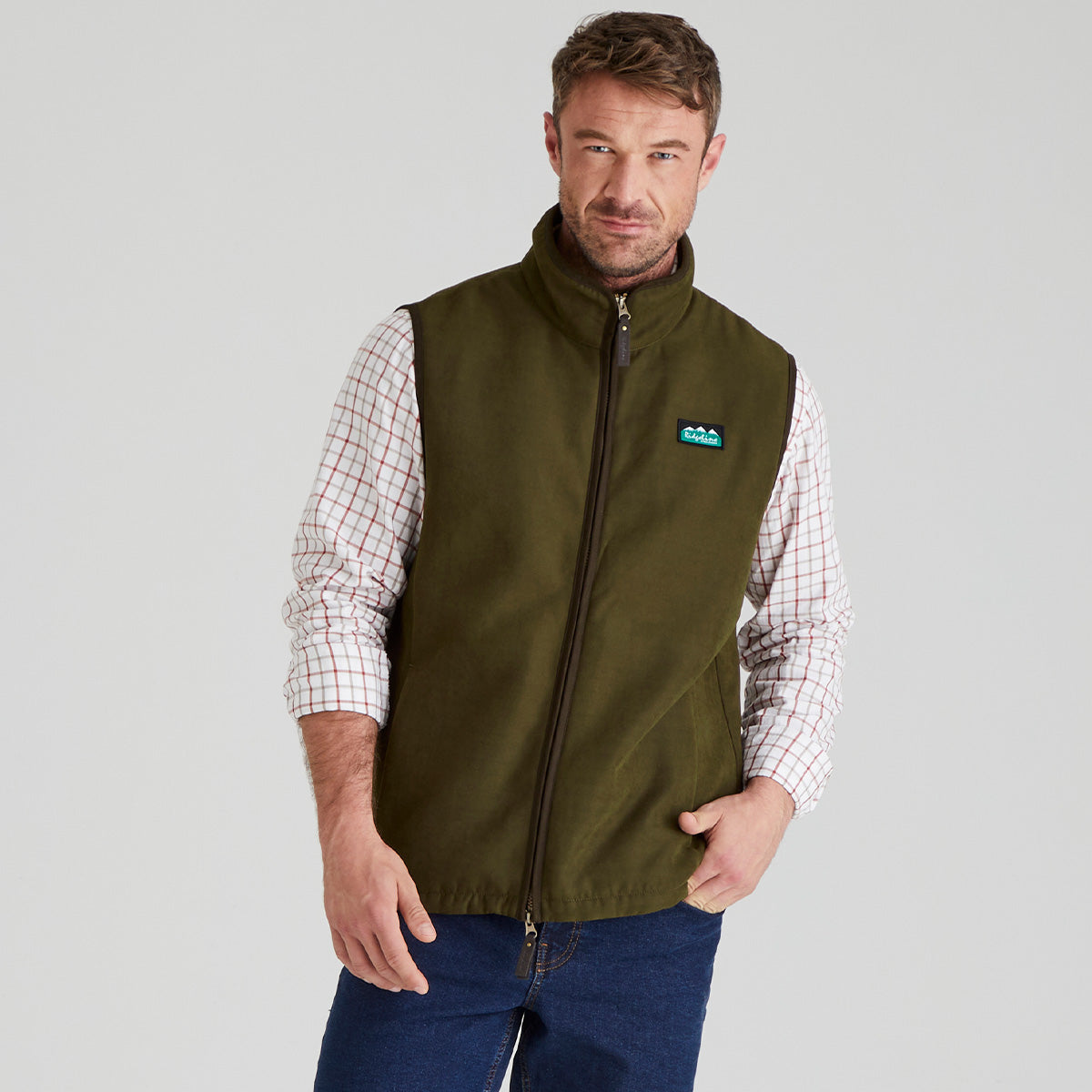 Man wearing Brown windproof fleece with Checked shirt