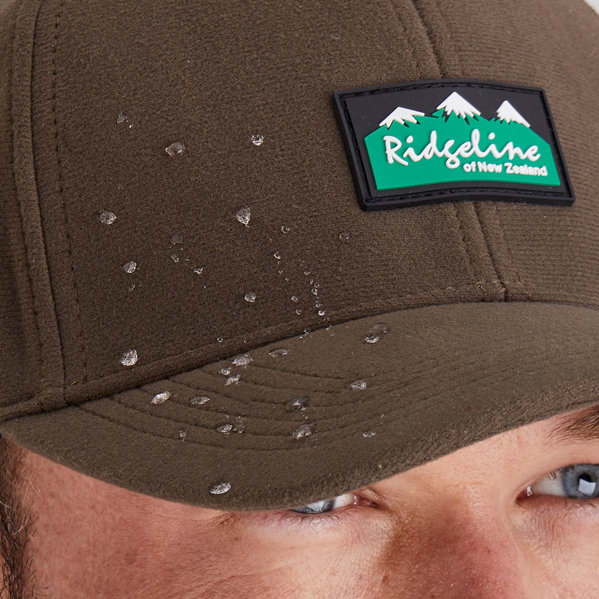Close up of waterproof features showing how water rolls off fabric