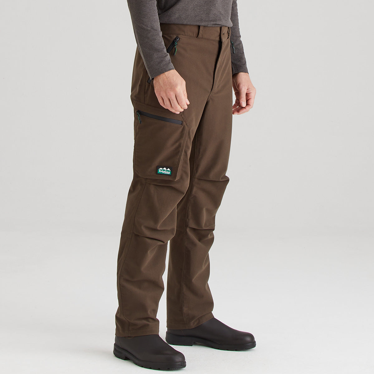 Brown pants with a brand logo on a white background