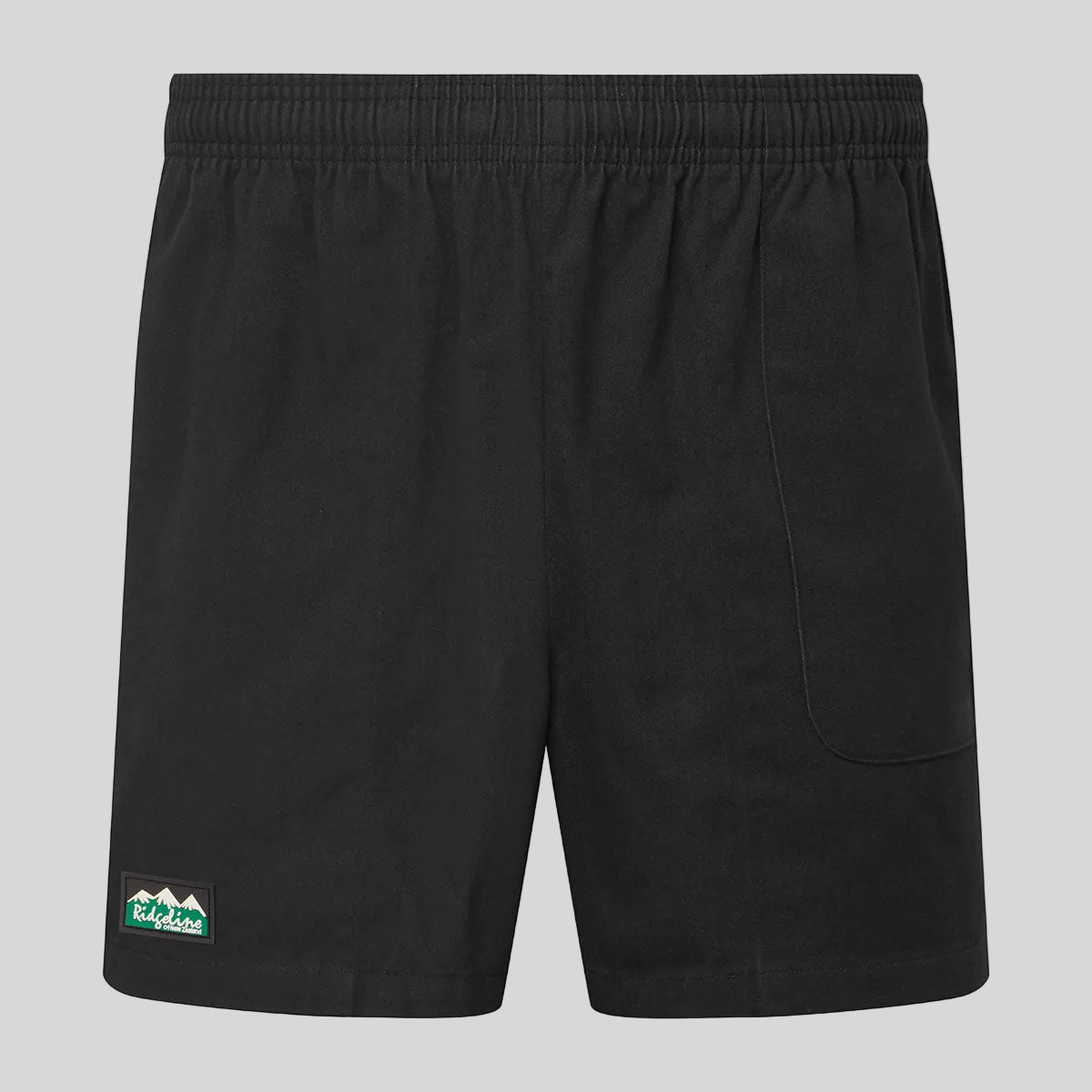 Black shorts with a brand logo on a grey background