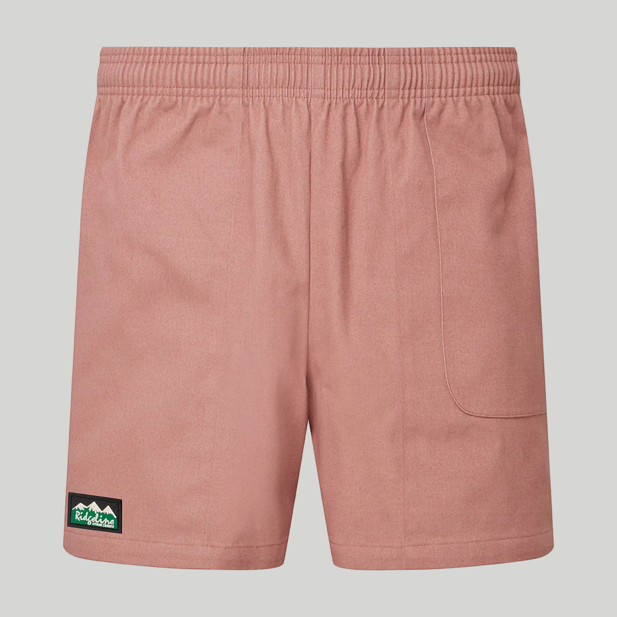 Pink shorts with a brand logo on a white background