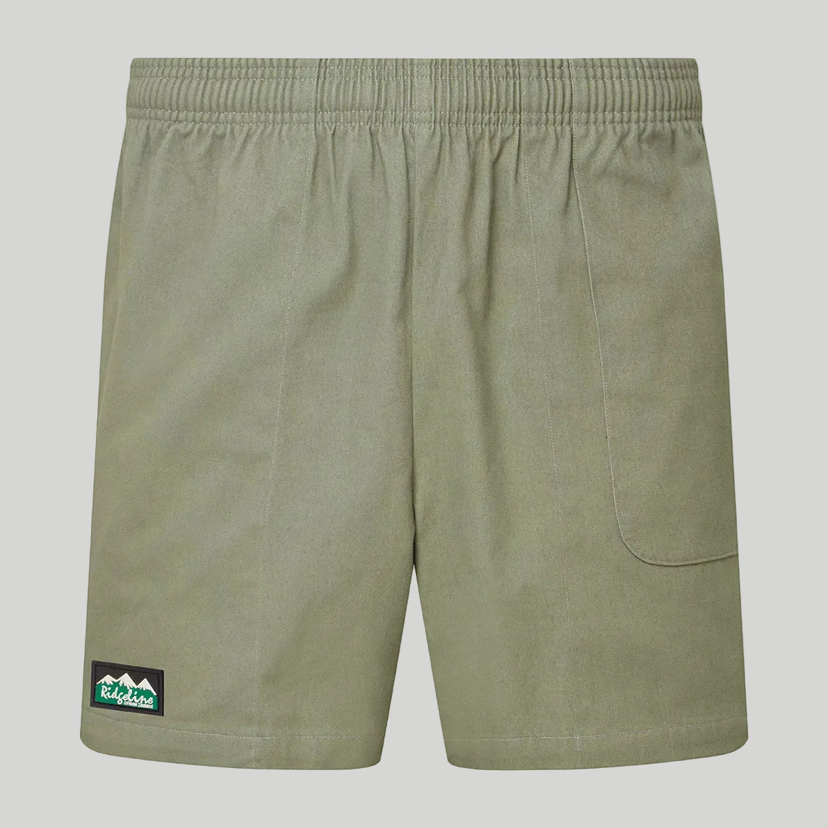 Green shorts with a logo on a white background