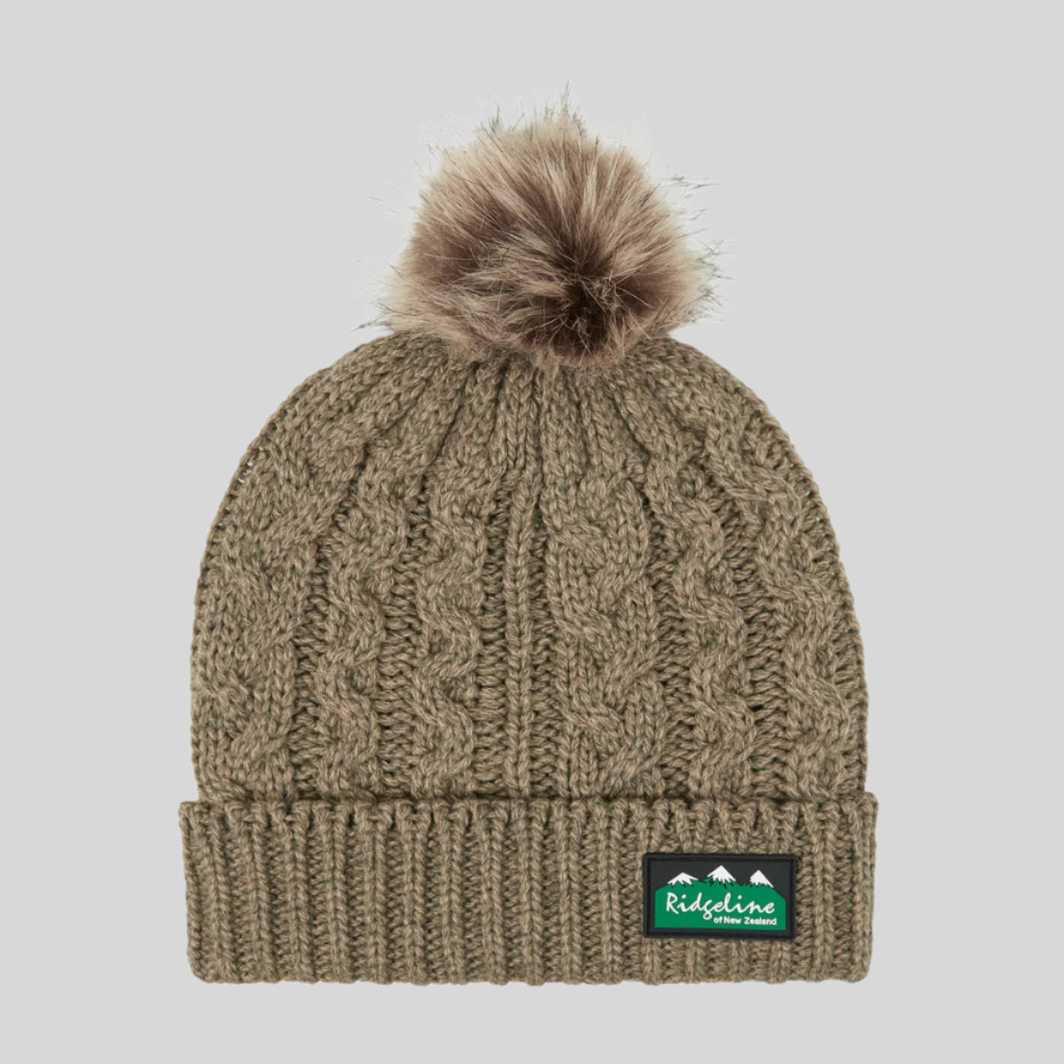 A brown flecked bobble hat with a faux-fur pom-pom on top and a wide ribbed band. on a white background