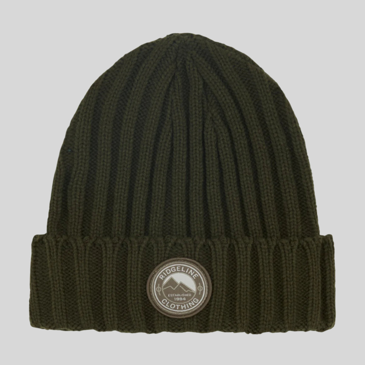 green Beanie hat with round Ridgeline Clothing Logo EST. 1994. On a white background