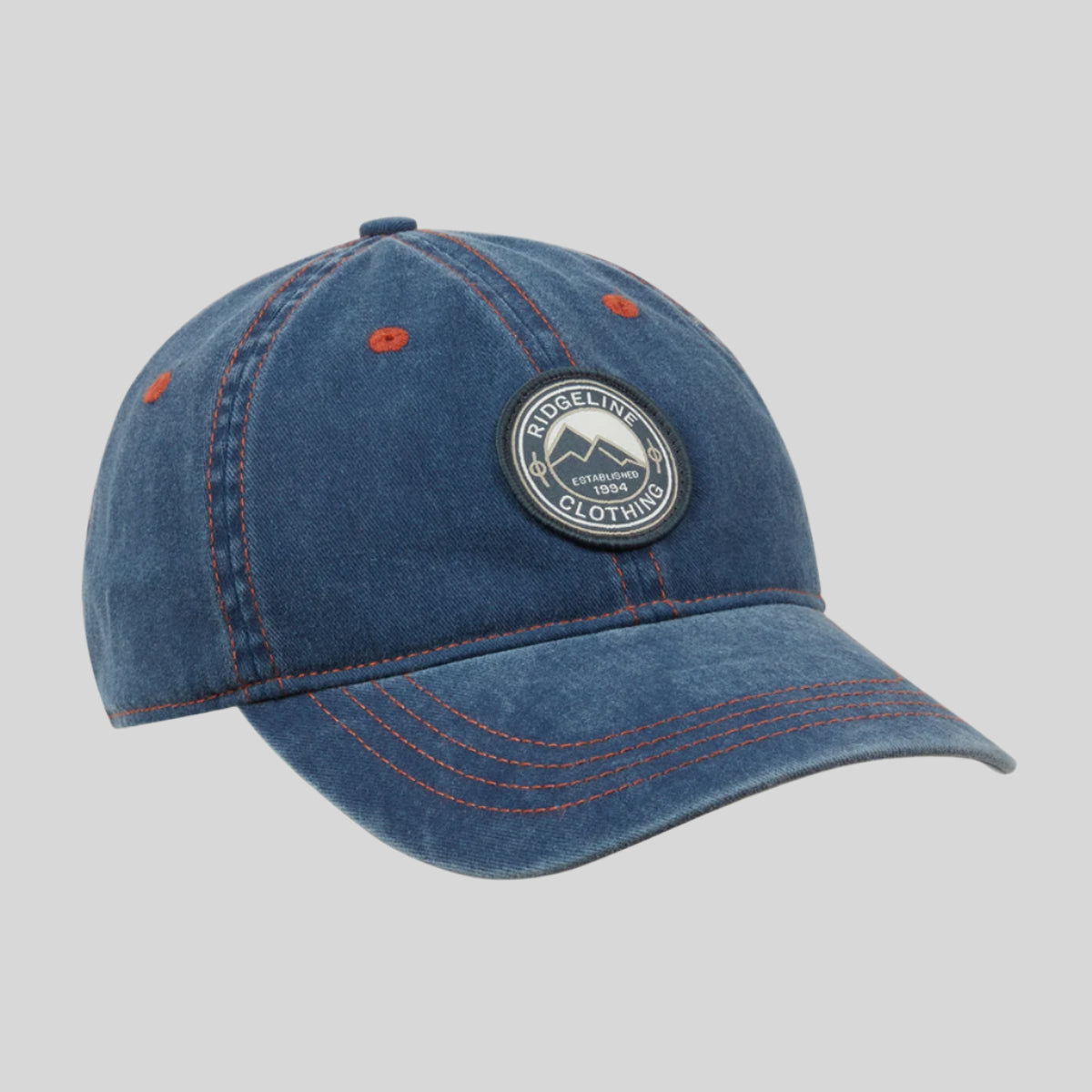 Denim wash cap with round Ridgeline Clothing Logo EST. 1994 On a white background