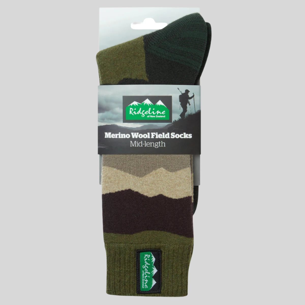 Packaged green and brown striped socks with Ridgeline branding on a white background